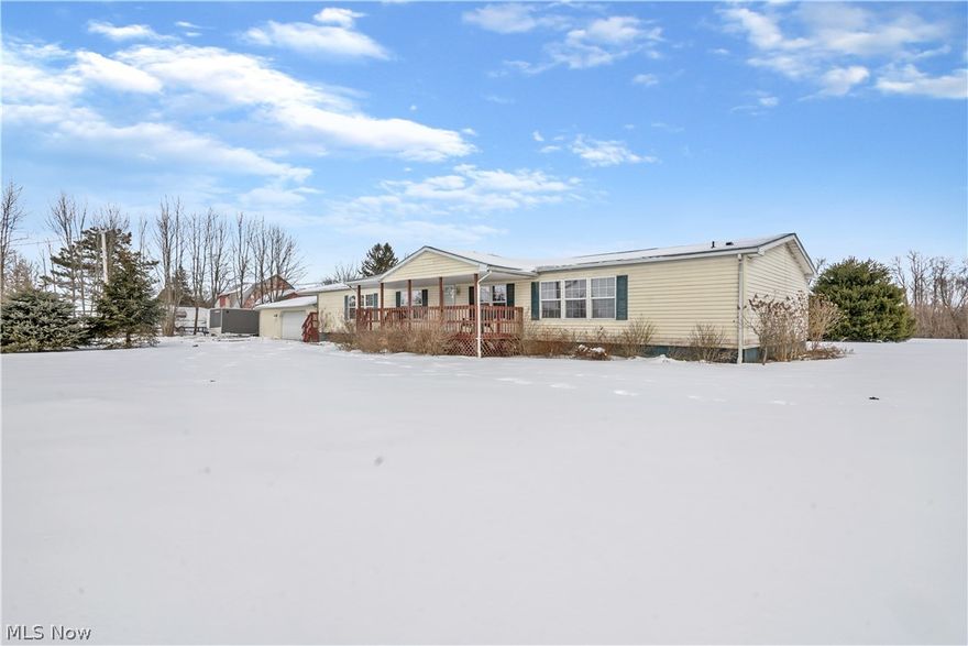 One floor living with a spectacular country view! If you enjoy the peaceful country scenery, this home is for you. Over 2400 sq ft that includes 3 large bedrooms and 3 full bathrooms located on 2.25 secluded acres. An open floor plan greets you as you walk into the vaulted family room with lots of natural light. You'll enjoy preparing your favorite meals in the kitchen featuring tons of cabinet space and a large island with seating for your guests. The huge Owner's bedroom feels like a retreat with its own fireplace, vaulted ceilings, and a private bathroom with a garden tub, walk-in shower, and large closet. The deck out back has a fantastic view and it's perfect for those days you want to entertain outdoors or relax on a warm sunny day. This home also comes with an attached oversized 2 car garage plus another detached 2 car garage with even more storage space, perfect for any car lover or someone who wants a workshop. Call today to schedule your showing and make this your new home!
