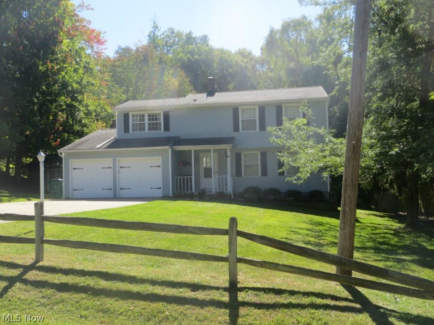 Nature Lover's Dream!  Many updates in the works!  New Hardwood Flooring on the entire 1st Floor!  Formal Dining Room;  Woodburning Fireplace;  Some New Trim and Cased Archways!  Stainless Appliances!  New Slider off Family Room to Large 16x20 Deck!  Partially Finished Rec Room (NEVER Flooded!)  This .63 Acre Lot offers Scenic Wooded Views and total privacy!  Shed!