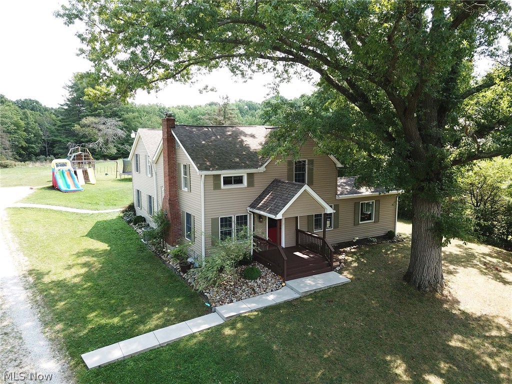 This completely renovated and improved, 1920's farmhouse has perfectly combined old style with new. An open and bright, kitchen, dining and living area flow beautifully into a fireplaced living room, welcoming entry, full bathroom, walk in pantry and an additional room that can be utilized as an office, additional dining space, whatever fits your needs! The upstairs is spacious and boasts two more full bathrooms, one in the master suite, and a laundry room.
The basement is partially finished and above the three car garage is a bonus room, currently used as an office.
The home is situated on 3 plus acres of nature at its finest, including green space, woods and a pond; all in sought after Woodridge School Disctrict. Improvements include: All paint, flooring, doors, and fixtures 2012, Roof 2010, HVAC 2017, Electrical 2012, Office above garages 2012 and Septic 2010 approx.