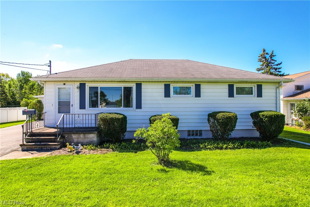 Welcome home to this very well maintained 3 bedroom ranch sitting on over an acre of land on the West Side of Lorain!!! Close to
shopping, dining, Lake Erie and all highways! Plenty of parking as well with your detached 2-car garage and an extra parking lot added
on to the side of the driveway! This unique home has everything you need to enjoy first floor living including a first floor laundry!
Original hardwood floors throughout the living room, hallway and bedrooms! Recently replaced stand up shower as well! This very
unique home also has a completely finished basement with a rec room, 2nd laundry room, tub/shower, full kitchen, dining room, living
room and bonus room which can be used as an office or 4th bedroom.....OR since the basement has it's own private entrance as well,
you could use it as a separate apartment or mother-in-law suite!!! Recent updates include first floor completely repainted, new garage
doors and opener, new storm and entry doors, new vinyl windows, new