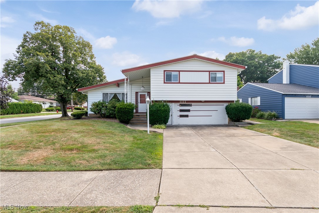 Welcome to 1111 Jackie Lane in Mayfield Heights! This spacious home offers 5 bedrooms and 2.5 bathrooms in a prime location near local schools, parks, and everyday amenities. Step inside to a bright living room filled with natural light and vaulted ceilings that create an open, airy feel. The dining room flows seamlessly into the kitchen, which features ample cabinet and countertop space. Just off the dining area, you’ll find a versatile bonus room that is perfect for a home office or hobby room. Upstairs, the large primary suite has a private ensuite bathroom, while three additional bedrooms share a full hall bath. The lower level expands your living options with your choice of a generously sized rec room or an additional bedroom, a convenient laundry area, and a half bath. Enjoy the outdoors in the fully fenced backyard, complete with plenty of green space and a shed for extra storage. Schedule your showing today!