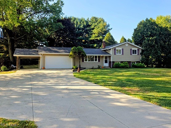 Location, location, location! This beautifully maintained home sits on 1 acre divided into two ½-acre parcels, with the home on one parcel and a buildable ½-acre lot for future expansion or investment. What truly sets this property apart is its unmatched location: just minutes from Route 88 and Route 14, University Hospital, Kent State University, and NEO Med, making commuting and daily life effortless. Outdoor enthusiasts will love being only 1 minute from the hike and bike trail, and the property backs up to Windmill Golf Course.
Inside, enjoy an open floor plan with a bright living room, cozy family room, and dedicated office. The kitchen flows seamlessly into the dining and family areas, creating a warm, functional space for everyday living.
Step outside to your private backyard retreat, featuring a concrete patio, mature oak, maple, and pine trees, and plenty of space for relaxation, play, or entertaining. Additional amenities include a concrete driveway, attached garage with carport, a new roof installed in September 2025, and city water and sewer service—all while enjoying the benefits of Ravenna Township.
With its prime location, dual parcels, buildable lot, city utilities, and a great private backyard, this property offers the perfect combination of convenience, lifestyle, and investment potential—a rare opportunity you won’t want to miss.