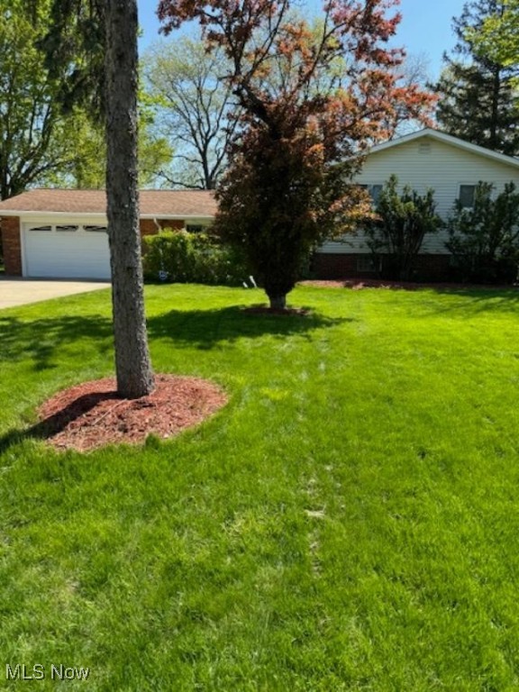 Bedford Hts split level, 3 bedrooms, 2 full baths, 2 car attached garage with openers. and rear patio. newly carpeted living room, hall and stairs. ceiling fans, central air. furnace and central air 2 years old. lower-level family room and den. vaulted ceiling. picture window in Livingroom. new front security door and gutter guards. well-manicured landscape. interior of property was freshly painted.