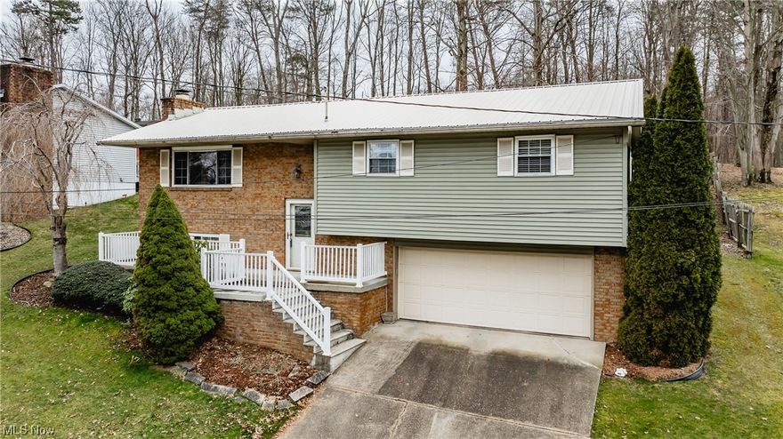 Step into this charming and inviting home where comfort and style come together seamlessly to create a welcoming atmosphere for you.  The main level boasts 3 bedrooms, 2.5 baths, hardwood flooring for a touch of elegance, while the living room offers natural light.  The spacious kitchen is equipped with all appliances making meal preparation convenient.  Descend to the lower level where a cozy family room awaits complete with a wood burning fireplace for those chilly evenings alongside a 4th bedroom, full bath and a practical laundry area.  Additionally, indulge in the pleasures of an all-season room and spacious deck perfect for entertaining friends and family.