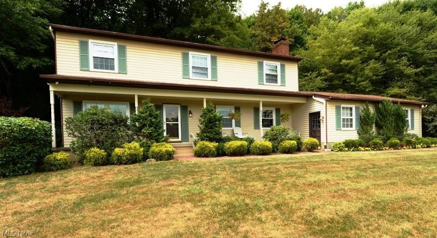 Unique 2 story with large solarium and hot tub. This home offers an eat-in kitchen with breakfast bar and a lower level with full bath and 3 finished rooms. Gorgeous views of property with 4 stall horse barn. Hardwood floors under carpets. Newer appliances. Fireplace and built in bookshelves grace the family room. Very private.