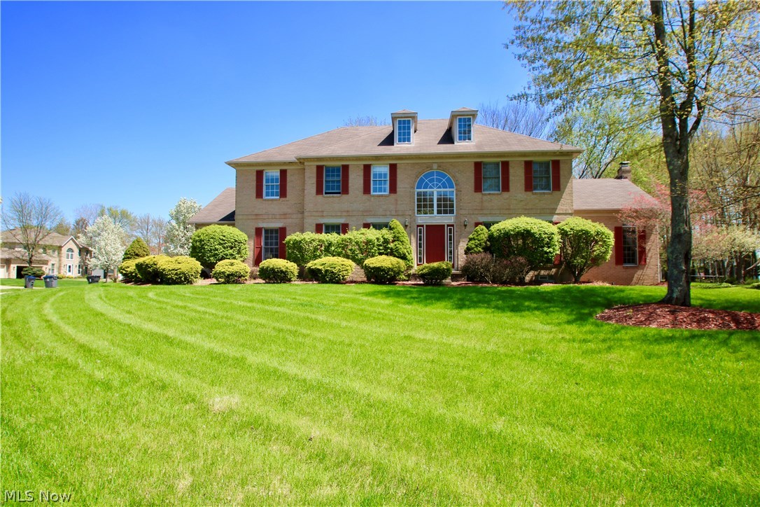 Welcome to this beautiful brick colonial within the development of Greenfield Village. This home is traditional in style with modern flare. There is an abundance of space for everyone with a total of almost 5,000 total finished square feet. The grand two story foyer with custom spindles along the stairs and extravagant chandelier make quite the statement upon entering the home. French doors lead you from the living room into the vaulted great room. Enjoy formal dining when needed yet have the comfort of an eat in kitchen for your day to day gatherings. This home is complete with a full finished basement to to be set up as you wish. All flooring throughout the home has been updated or refinished. Both master bedroom closets have been custom designed and one with a gorgeous custom french door added. There is a second master bedroom upstairs in addition to two bedrooms connected by the jack n jill bathroom on the east wing of the upstairs. This home has been very well maintained and now w