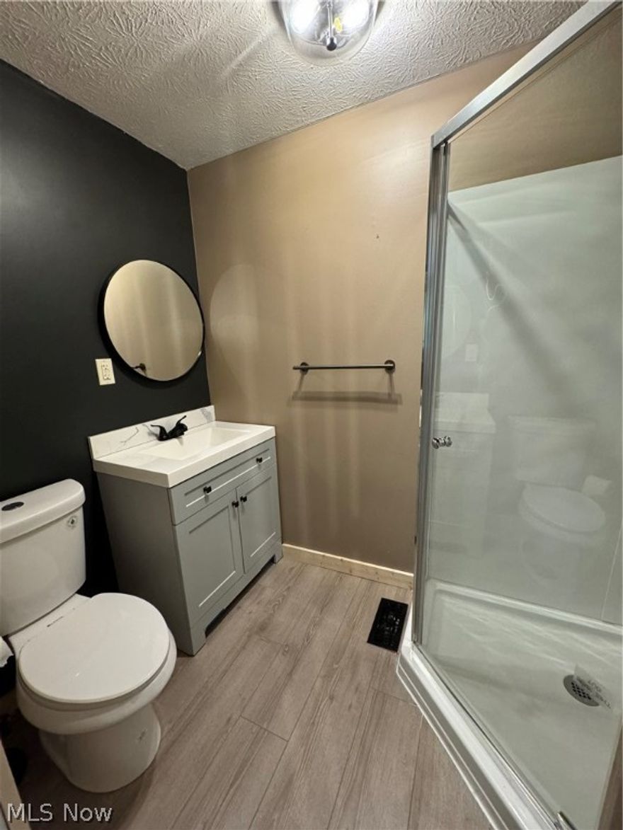 This newly remodeled 3 bedroom, 2 Full bathroom home is nestled in the heart of a river community! NEW roof April 2024, NEW bathrooms (2), NEW kitchen with butcher block kitchen island/breakfast bar, NEW kitchen appliances, NEW 200 amp electric service, NEW hot water tank, NEW subfloor throughout 1st floor and NEW tile flooring, NEW paint, New side patio. Concrete floor crawl space. Electric furnace with heat pump , central air, inspected by Dowler February 2024. Living room has wood burner for supplemental heat, refinished 2nd floor balcony, 2nd floor baseboard heaters are supplemental.  Immediate possession.