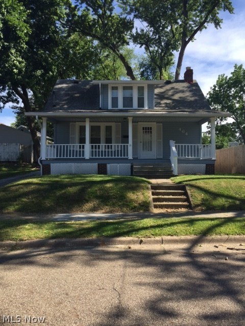 Such an awesome house! Don't wait to see this one. Very spacious 2 story home featuring large kitchen and living room, formal dining area, remodeled bath, newer carpet, fresh paint, full basement with laundry hookups and plenty of storage, magnificent front porch, oversized 2 car detached garage, private drive and a yard! All of this within a 1/2 block of Towpath Trail!