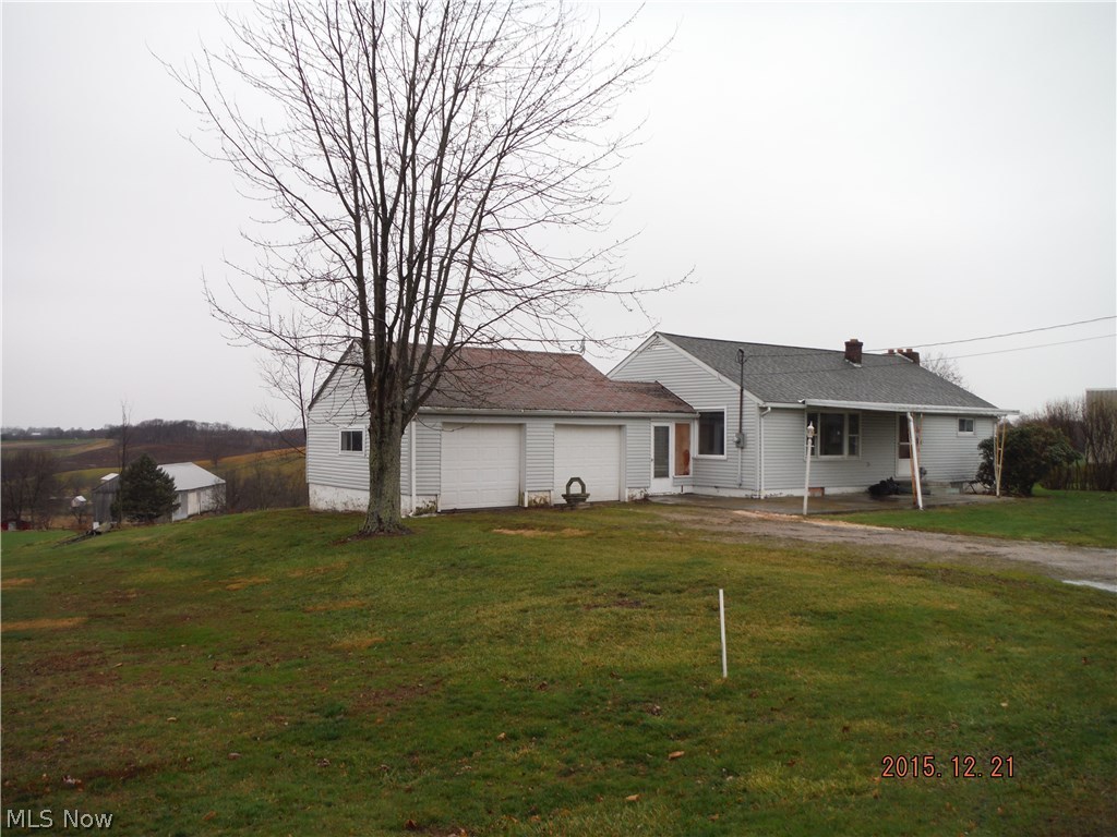 Countrysetting in Paris twp. Ranch home with attached garage on .71 acres. Partially fenced backyard. Breezeway between house and garage. Living room and dining room open to kitchen. Walkout basement with full bath and cozy fireplace. Needs some TLC. Being sold AS IS.