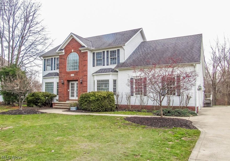 Welcome home to this 5-6 bedroom, 4 full bath home in Concord in Mentor Schools system! It's everything you are looking for! Find your culinary inspiration in the stunning kitchen with a 9-ft island, granite countertops, double oven and double countertop range. This eat-in kitchen has access to your deck to enjoy the view with your morning cup of coffee. The spacious great room boasts an elegant gas fireplace and ample natural light. It's a wonderful room for entertaining all your guests! The dining room off of the 2-story foyer features a picture window that illuminates the room with natural light. The private living room in the front of the home can also be used as a den or an office. A laundry room and full bath complete the main level. Walk upstairs and be overly impressed with the enormous master suite with a tray ceiling, 2 walk-in closets and enough room for a sitting area. It also features a sliding door to a private deck. The jaw dropping 16x15 master bath offers dual vanities and a relaxing soaking tub. There are 4 additional bedrooms upstairs, some of which have been freshly painted. Need even more living space!? The lower level of this home offers another bedroom and a full living suite with a kitchen, full bathroom and a walkout to your private patio. This home even has a 3-tier deck, an aboveground pool and newer furnace and A/C! Situated on a cul de sac, this is a must see!