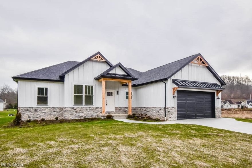 This stunning new build in Meadow Glen is waiting for you! Upon entry through the front door there is an office with abundant natural light and a mudroom with a convenient built-in boot bench with direct access to the 2 car garage.Waterproof vinyl flooring continues throughout the inviting living room and eat- in kitchen. The kitchen boasts custom Coffee Run construction cabinetry featuring both full extension and soft close capabilities. With black stainless steel appliances and walk in pantry this chef's kitchen is perfect for preparing your favorite meals and spending time with guests. This home has a desirable split bedroom layout. The private master suite includes a walk-in closet, a stunning full bathroom with double sinks, soaking tub, and stand alone shower with dual heads. There are 2 additional sizable bedrooms and a full bathroom with great finishes. The first floor laundry makes this home desirable and completes the main level. A partially finished lower level includes plum