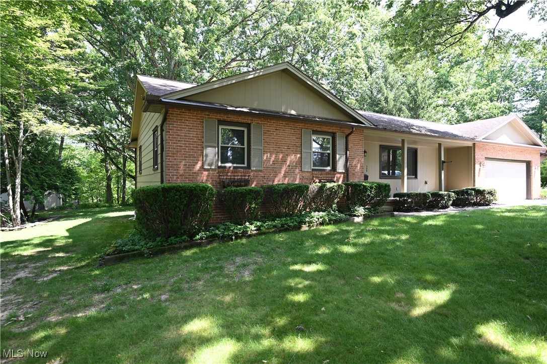 Welcome to 755 Blueberry Hill Drive. Situated on one the nicest land most picturesque locations on the street, this lovely, 3 bedroom, 2 bath ranch, in the heart of Canfield, gleams brightly from the street. Truly a retreat in every sense of the word. Pre-Inspected by ASHI-Certified home inspector (Report available upon request.) Canfield Schools! Many renovations have been made over the course of years, including the addition a huge (20 x 23) recreation room in the rear of the house built by an acclaimed local carpenter of the time. Custom built-ins and fireplace adorn this this room, as well as many LARGE WINDOWS overlooking a beautiful back yard with mature trees. A large deck is accessed through a slider from the rec room and family room. Updated kitchen and baths. All appliances staying (mostly newer), including new washer and dryer. The other side of the home offers a Master bedroom with full ensuite and two other bedrooms as well as a full bath. Just minutes away from the Canfield Village Green and the MetroParks bike trail, not to mention a close proximity to a bustling shopping and restaurant district.