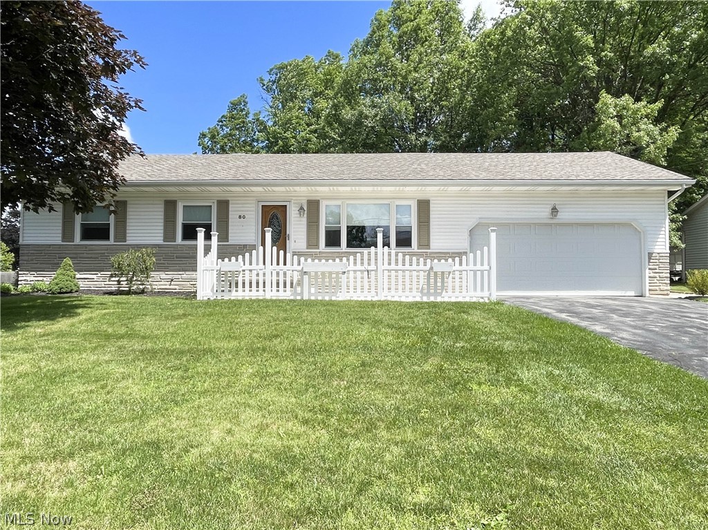 Don't miss out on this impeccably maintained and absolutely gorgeous Austintown stunner! This pristine 3-bedroom beauty is the perfect place for you! With its many updates, new roof with lifetime warranty (2023), new flooring throughout, updated bathrooms, vinyl tilt-in windows, gutter-guards, and all appliances included, this adorable abode is MOVE-IN READY! You'll feel the warmth and notice the fine attention to detail from the moment you first arrive. Situated on a HUGE corner lot, with sidewalks, this property is just as lovely inside as it is out! The fenced-in back yard offers serenity in a park-like setting you can call your own. The heated sunroom (included in sq ft listed) that overlooks this incredible space features reflective window tint, allowing light and nature in without sacrificing privacy. The spacious formal living room flows nicely into the formal dining room, with open access to the eat-in kitchen and sun room, making this home great for entertaining and gatherings. The full basement is neat-as-a-pin and has another bathroom, washer and dryer are included, and has an additional room that could be used for storage, hobbies, a workshop, cellar-dwellers, or whatever your heart desires! Did we mention the 2 car attached garage?? ...But don't take my word for it... Come and see for yourself before this amazing property is gone!