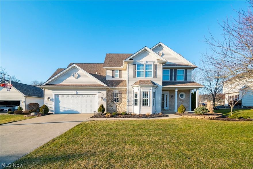 Welcome to 3795 Heathery Circle! Located in the desirable Turnberry Development, this stunning custom built colonial boasts 4 bedrooms, 3 bathrooms, hardwood floors, a two story great room with fireplace, and so much more! You are instantly welcomed by a vaulted foyer and a beautiful formal dining room. Main level offers a spacious open floor plan and is filled with natural light. Kitchen includes custom cabinetry, a walk-in pantry, and window giving view of the vaulted great room with a stacked stone gas fireplace. Master suite includes a walk in closet, vaulted ceilings, double sink vanity, skylight, shower, and a whirlpool tub. The 3 remaining bedrooms and full bath round out the upper level. The basement offers a media room with built-in surround sound, rec room, and an extra space that can be used as an office or a fifth bedroom. Also included is plumbing for a 1/2 bath and loads of storage space. The dining room grants access to your extended backyard and gorgeous patio with buil