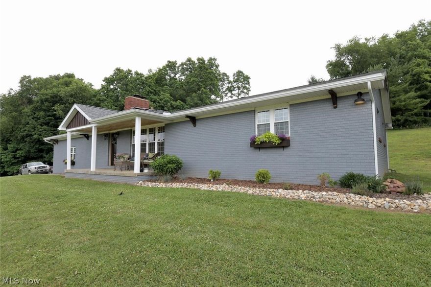 This beautiful ranch home offer an open concept with a large living room and fireplace, new kitchen with custom cabinets and granite countertops, three bedrooms , new bathrooms up and down, the lower level has a finished family room with a brick fireplace, attached 30 x 30 two car garage , 24 x 24 pole building and 2.65 acres.