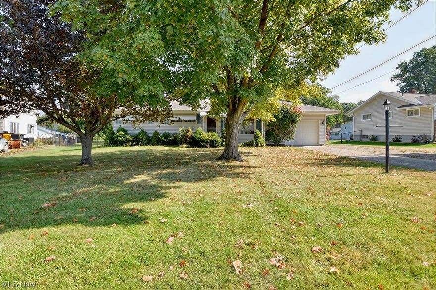 Welcome Home to this well-kept ranch located in a quiet neighborhood. Move in and enjoy your days on the covered front patio, the cozy living room with electric fireplace that stays, the huge sunroom with smooth pebble flooring, or the spacious back yard with covered patio. Let the dog run because the large back yard is completely fenced in. Enjoy cooking and entertaining in the spacious open kitchen and dining area. Take your pick of 3 cozy bedrooms. The attached garage offers storage and laundry area. There's a shed for more outdoor storage and it's an easy location to shopping and restaurants. Patio furniture and lawnmower come with the property.