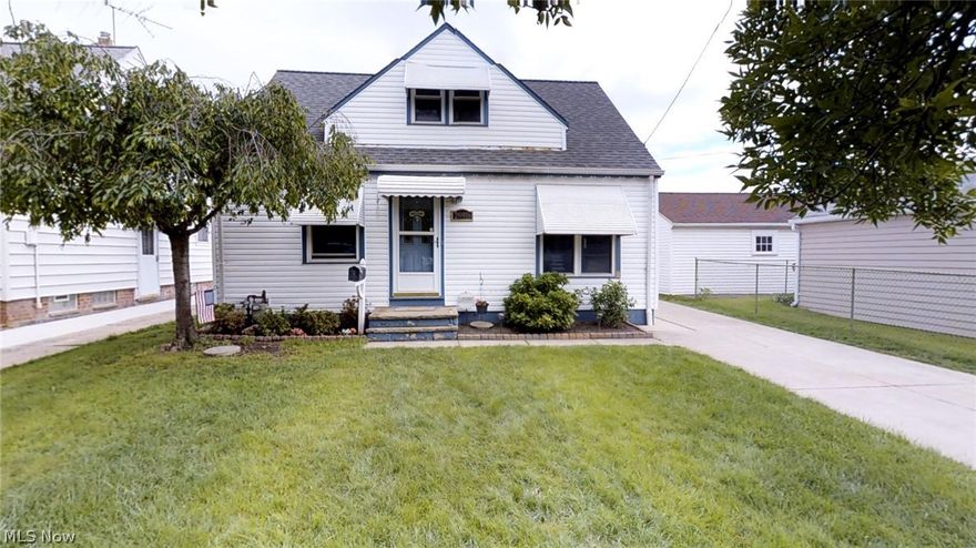 Move in ready 4 bedroom home in Wickliffe.  This adorable home has a nice size living room with hardwood floors that have been refinished.  The utility room is off of the kitchen for convenience and there is also a dining room.  A covered walkway leads from the house to the detached garage.  2 bedrooms are on the main floor and 2 on the second floor.  Some of the updates include New Windows 2010, Exterior Waterproofing 2010, HW Tank 2011, Freshly Painted Kitchen and Bath, New Garage Door, Siding 2015, Roof 2009, New Ceramic Tile in the Dining Room, New Electrical and Plumbing.  The bathroom was completely gutted and updated with a new shower, toilet, vanity and fixtures.  The garage is the size of a two car garage, but has a single car door.  Easy access to Rt. 2.