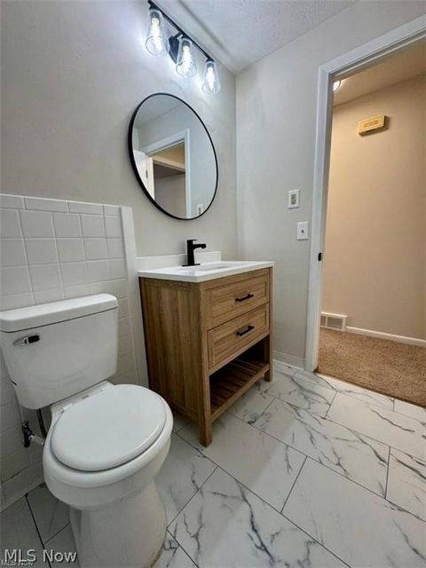 Tiny photo for 233 Kennedy Street, Louisville, OH 44641 (MLS # 5203175)