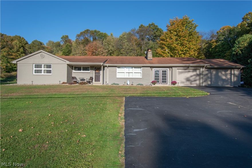 What an Awesome home in a beautiful wooded area with quite surrounding you. When you walk into the home you are greeted with a large Livingroom that is prefect for entertaining or just relaxing by the fireplace on a cold Ohio night. The kitchen has been updated with all new cherry cabinets by Craft Made and has plenty of counter space, and an eat in bar area. The dinning area is spacious and wonderful for having holiday dinner. There is a lovely Florida room that would be amazing for relaxing and watching the deer's in your back yard. The bedrooms are large and the home has two full bathrooms. The basement is a full dry basement that has two additional bedrooms and a full bath, that can be converted into anything your hearts desire. This home is really a must see!
