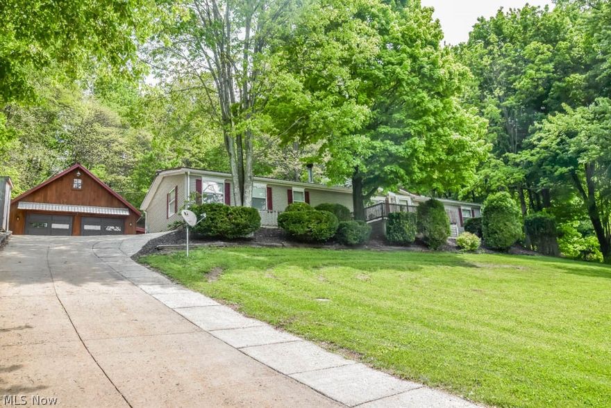 Beautifully updated ranch on a private 1 acre lot! So many improvements throughout this home including a remodeled kitchen with tons of cabinets, new countertops, & a center island adjoined by a dinette with a sliding door to the deck. The living room features updated flooring & a gas fireplace surrounded by built-in bookcases. There's also a family room with laminate flooring, crown molding, & a ceiling fan, the perfect spot to watch a game! The split bedroom design affords privacy to the owner's suite complete with a spa like full bath with ceramic tile floor, tiled shower with dual shower heads, & a walk-in closet that can also be accessed from the bedroom. A sliding barn door reveals a bonus room that's currently used as an office. Two additional bedrooms on the other side of the home share a full bath with a new countertop & flooring. A 1st floor laundry is another great feature. The backyard is an entertainer's paradise with a covered porch for outdoor dining & a tiered deck that surrounds a 13 x 26 saltwater pool with a covered cabana! The oversized 2 car garage features a workbench area & a 12 x 14' loft with pull down stairs & a platform with hoist. The 12 x 20 shed also has a loft for even more storage. Added amenities include a covered front porch, 30 amp/220V electric in the front yard for a camper, a turn around in the drive, & metal roofing on the house & garage.  You won't find another home with this many features & upgrades at this price ~ Don't miss out!