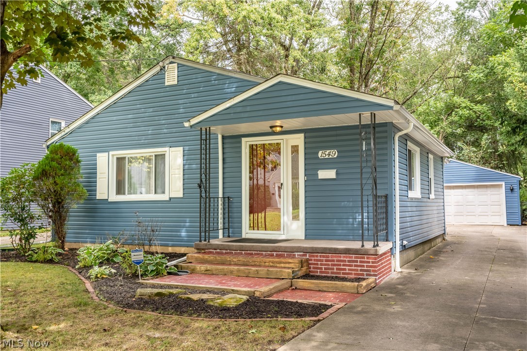 Welcome Home to 1549 Idlewood Avenue in Akron. Located on a quiet and quaint street in the highly desired Wallhaven area, you can enjoy nearby restaurants, coffee shops, shopping, and so much more. A charming “blue house with the red door” will be how you describe YOUR home to all of your guests. This spacious and comfortable ranch home features a living and dining room that is well lit with beautiful natural lighting, 3 bedrooms, 1 bathroom and finished basement. Gorgeous hardwood floors are exposed in the bedrooms and are throughout the home if you so desire. This home has been carefully rejuvenated and refined and is ready for your personal touch. The all white kitchen is equipped with a fully operating nostalgic double oven, great for the baker and/or chef of the family! Re-modeled and pristine full bathroom help make this home move-in ready. The finished basement with plenty of storage and bar is perfect for entertaining. The backyard can be your private oasis. With a newl