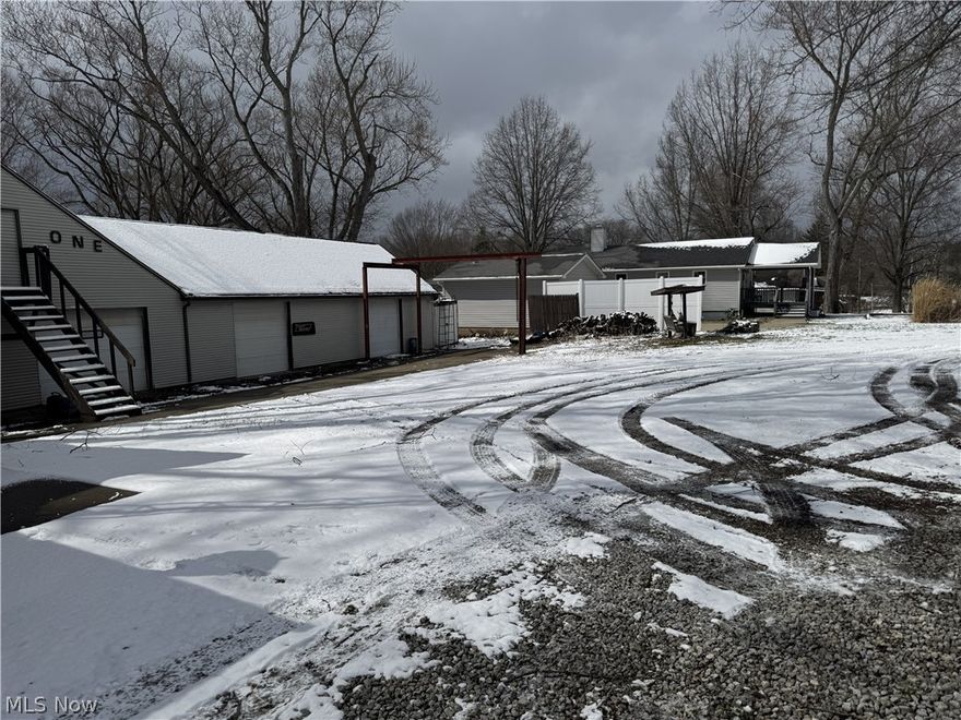 Handyman special! 2 Possible 3 bedroom ranch. 4 Bay, detached garage with concrete floor, electric, toilet & sink and storage. Bring your ideas to make this home shine. Sold "as-is". No money for any repairs.