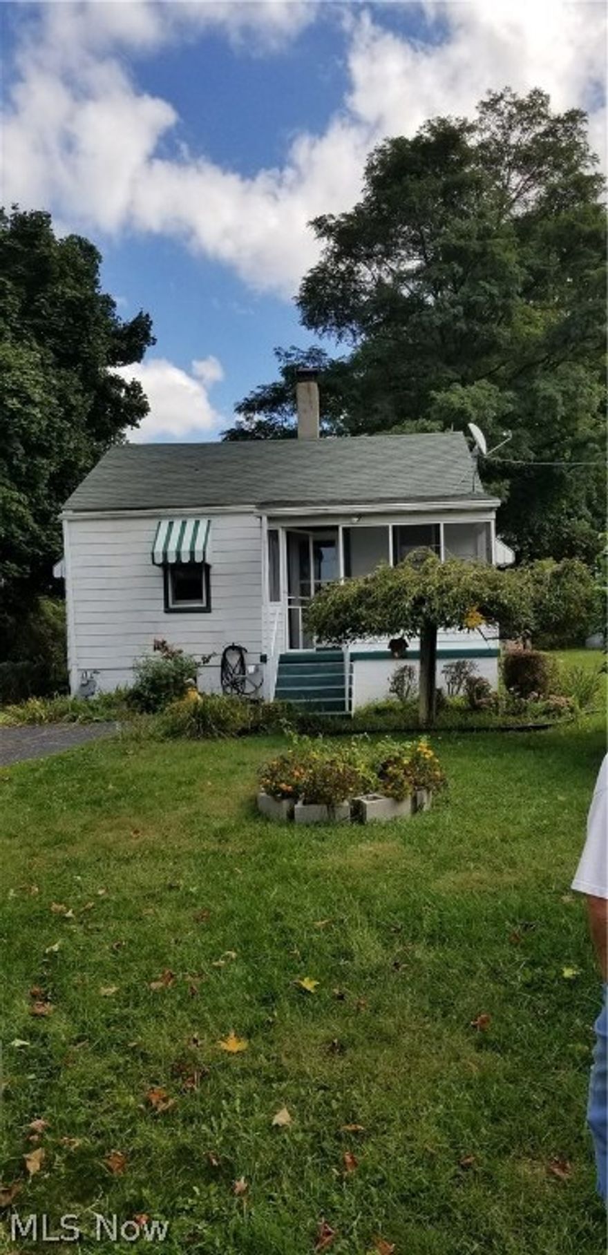 The original home has 2 bedroom, but this home has a great addition, use it as a bonus room or a 3rd bedroom.  It has real hardwood floors, a closet and built in shelves.  The lennox furnace replaced in 2010, Roof and awnings was replaced in 2009, Electric was updated in 2006. Sump pump installed in 2014.  There is also a lotamus security system.