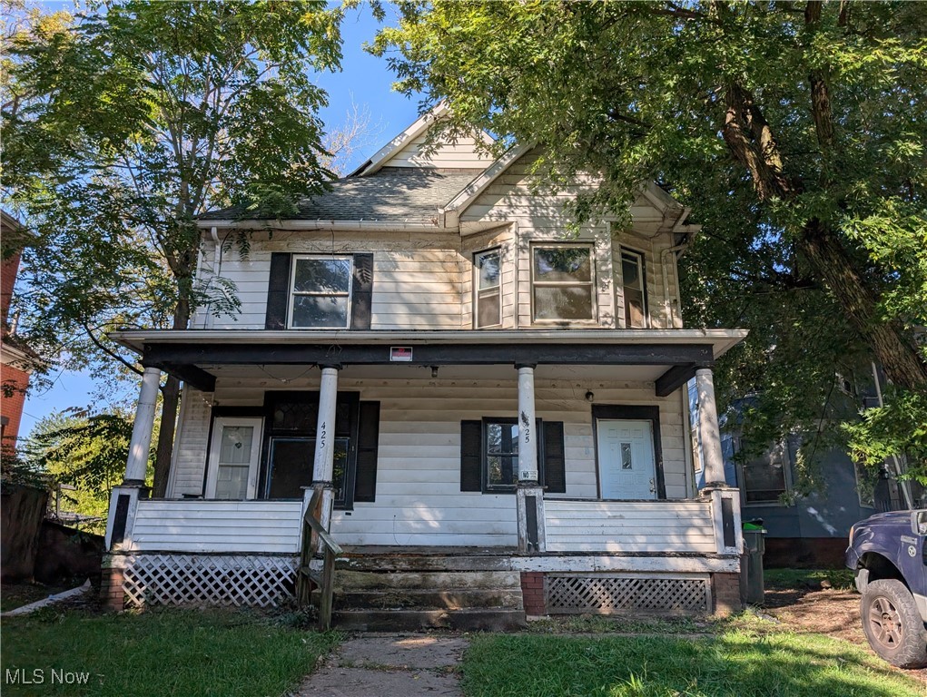 Wonderful investment opportunity. Up/down duplex in a convenient city location near highways, public transportation amenities and all services. The building was in the process of a renovation and some work was completed prior to listing. Desirable features include  a gorgeous fireplace in the lower unit, pocket doors and over-sized woodwork. Some newer flooring. Laundry area in basement is accessible from lower unit. Separate gas meters. Electric baseboard heat in upper unit with gas-fueled forced air heat on first floor. There is an alley at the rear of the property allowing for  access from the back. Plenty of room available for a new garage. Call your favorite agent today!