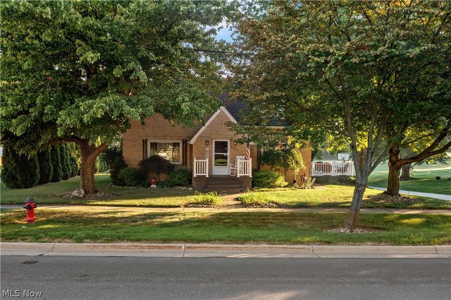 Welcome to this meticulously maintained 4-5 bedroom, 2.5 bath brick home located in desirable Lake Local Schools within walking distance of downtown Hartville and convenient access to restaurants, schools, and shopping! Upon entering the home, you will notice the beautiful fireplace and spacious living room. On the other side of the staircase is the dining room that boasts a rustic barn door on your way into the kitchen. You will love the island, ample cabinetry, and well-appointed appliances in the kitchen. There is also access to the deck perfect for morning coffee! Also, on the main level is a bedroom or office if you prefer as well as a full bath. Up the stairs you will find three more bedrooms (with built in dressers), and another full bath. In the lower level there is a workout room (or playroom), impressive laundry room, mudroom, the 5th bedroom, and a half bath! The exterior of the home is just as impressive as the interior with an extra large 3 car attached garage, private bac