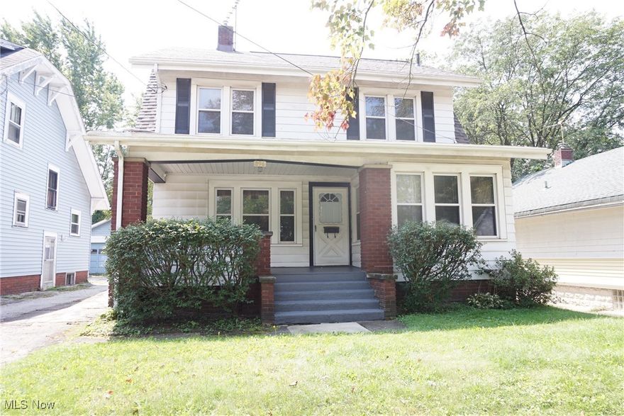 Large, four-bedroom Century colonial with an inviting, covered front porch. Features beautiful natural woodwork throughout. Gorgeous wooden French doors lead into the solarium from the living room. Bookcases with wood and glass doors on each side of the fireplace. This home has a large dining room with a bay window/window seat with built-in drawers for storage. A slider leads to the covered deck with sitting area and a very nice hot tub! Fenced backyard, too. Beamed ceiling in a spacious kitchen with cabinet and counter space galore! Bathroom is updates with a walk-in shower and a great makeup vanity desk to prepare for the day. The two-car garage with new openers and garage doors. Driveway is shared but there is a concrete parking area in front of the garage. New front door and slider to deck. Recently installed vinyl flooring in kitchen. Roof replaced in 2020.