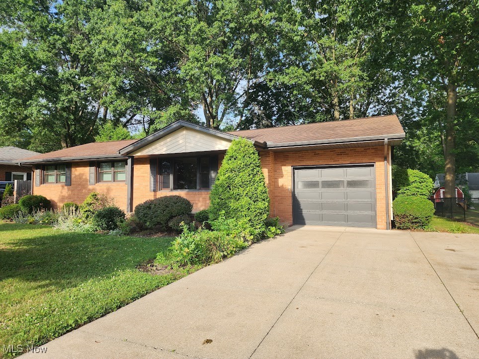 Charming well maintained Brick Home in Wadsworth. This home features a fully applianced eat-in kitchen with amble space for cooking and entertaining. The main floor features a living room with hard word floors, 3 Bedrooms and an oversized Full Bathroom. The Lower Level has a beautiful finished area with wood plank walls and built-ins, 2 separate areas for extra storage, one with shelving and another Full Bathroom and separate laundry area including a washer and dryer. Enjoy entertaining on the patio in the spacious backyard which is partially fenced in. A one year Home Warranty is included for peace of mind. Call to schedule a private showing!