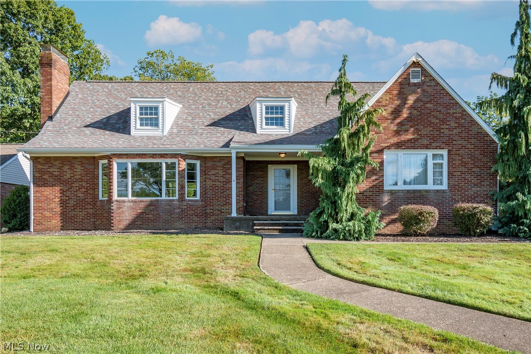 Welcome to 1025 Grove Street! This charming four bedroom, two bathroom brick cape cod boasts .79 acres and 2,441 square feet! Enter into large foyer that opens up into an over sized living room with fireplace, room for game table and formal dining room adjoining. An updated kitchen, area for a breakfast room, full bath, bedroom, and office round out the main level. Remaining three bedrooms and second full bath are located on the upper level. Large basement features a family room, laundry room, built-in tool bench, and loads of storage space. Enjoy your summer evenings on your back patio overlooking a private partially fenced in backyard. 2 car detached garage and newer (2017) concrete wrap around driveway. Other updates include: Roof replaced on house and garage (2021), siding on garage and house dormers (2020), gutters (2021), garage doors (2015), Trane Furnace (2014), A/C (2019), HWT (2018), sump pump (2018), and water softener (2018). Conveniently located near Walsh University and W