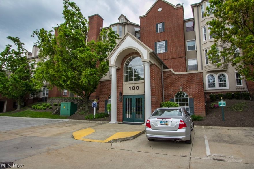 In peaceful & private Fox Hollow at Woodhawk condominium community is this pristine, updated 2 bedroom 2 bath ranch you won’t want to miss!  Large Living room/Dining room with gleaming wood floors is dripped in sunshine with a full wall of windows and is a perfect place for family gatherings. Master bedroom has walk in closet and master bath with ceramic tile flooring. Eat-in kitchen with bay window, ceramic tile flooring and all appliances. Bedroom 2 has access to second full bath with stackable washer and dryer. Enjoy the outdoors from your private covered patio which overlooks the complex courtyard. Assigned 1-car garage with additional storage lockers. 24 hour staffed gatehouse. Additional amenities include 2 swimming pools, tennis and fitness facilities. First floor living at its finest!