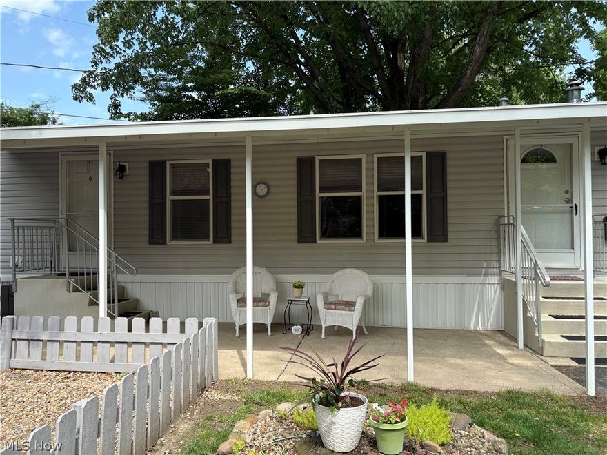 Charming 2-bedroom, 2-full bath mobile home located in the highly desired Avenue Woods, a secluded 55+ community.  Nestled in a serene wooded setting you can enjoy lounging on covered porch with morning coffee or outdoor dining.  The home reflects true pride of ownership and features a large kitchen with ample cabinetry, a breakfast bar, and both a stainless steel refrigerator and a convection oven range.  For privacy the bedrooms are located on opposite sides of the home and offer plenty of natural lighting.  The primary suite includes dual closets and a bathroom featuring a skylight and a faux-stained glass window.  The two sheds provided ample storage.  The home is conveniently located near restaurants, grocery stores, the freeway, and Lake Erie. Community is pet friendly.