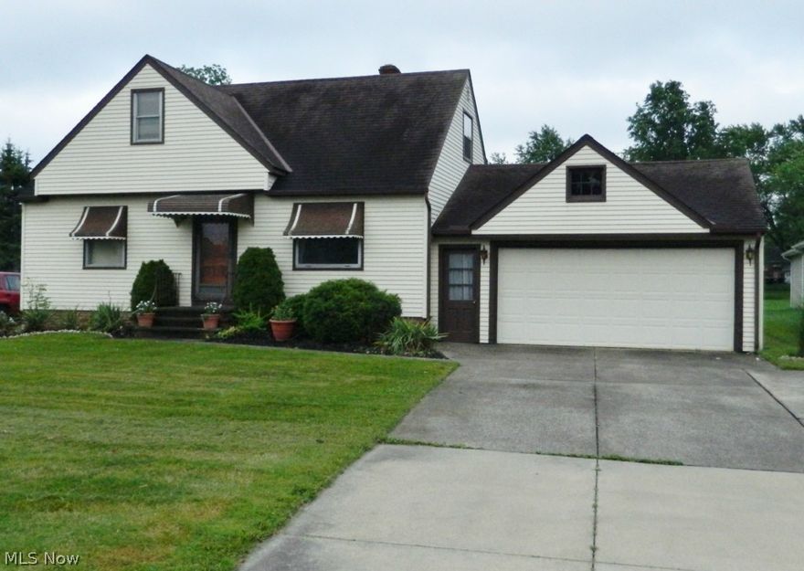 Solid, well built home with hardwood floors sitting on a 65 x 275 lot. Attached 2 car garage has a drive-through overhead door on the back of it for easy access to lawn tractors etc. Off the rear of the garage is a large 24 x 20 patio and 11 x 20 of it is covered. Large 12 x 30 rec. room in basement plus bathroom in basement with a shower, sink and toilet. Open stairway off living room to second floor. Hardwood floors throughout. Nice L-shaped kitchen with lots of cabinets and counter space. Excellent Independence schools.