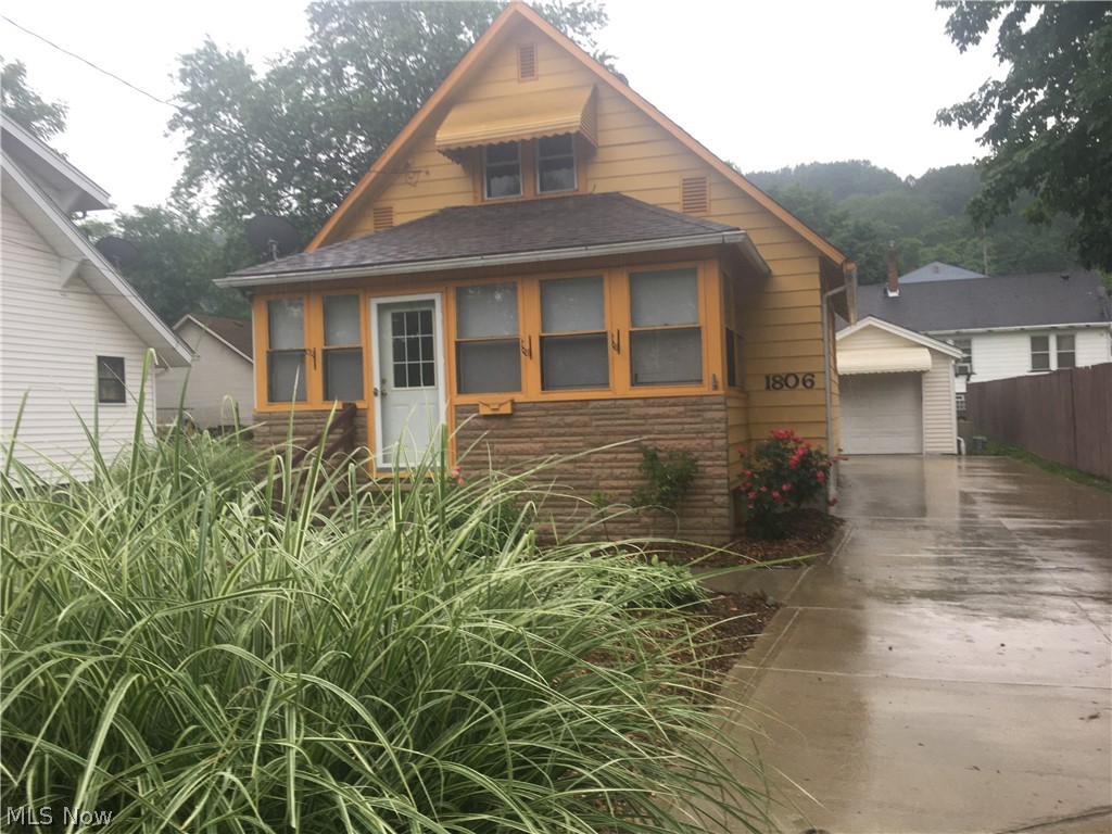 Adorable two bedroom home located on the west side of Summit Lake with great lake views. Enjoy the view from heated enclosed front porch. Home also has new carpet in first floor bedroom and living area. Several different ways to set up home. Second carpeted room could be formal dining area or tv room. Kitchen could have second eating area, or a large mudroom, or room to be used as formal dining area. Huge bathroom located on first floor. The second bedroom (which is two connected rooms) could be used as multi bedroom, or office and bedroom. Use your creativity to set this house up to fit your needs. Beautifully landscaped front yard, large back yard, gardening areas available if wanted, one car garage, and long pave driveway to fit more than one car. Professionally managed, $35 application fee per adult, online applications.
