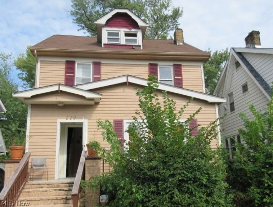 Stately two story colonial situated on a quiet, lovely tree lined street.  Exterior in need of a little tlc but the character still shines thru on this one.  Deep yard with mature trees providing ample shade for the hot summer days.  Traditional colonial floor plan.  Formal dining room with pergo flooring and built in cabinets.  Three good size bedrooms on the 2nd floor, and a large dormer/master bedroom set up on the 3rd floor.  Full bath on the second floor in modern and only in need of a little elbow grease.  Home being sold as-is.  Buyer to assume any/all city POS violations.