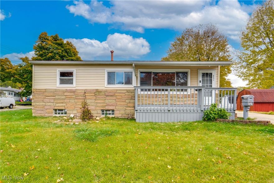 Step into charm at 2953 Clearfield Avenue in Akron, Ohio! This stunning 3 bedroom, 1.5 bath home has been fully renovated, ready to steal hearts. The kitchen dazzles with sleek new cabinets, countertops, and appliances. Fresh paint and flooring flow throughout, with a revamped first-floor bathroom featuring a new vanity, flooring, and toilet. Downstairs, you’ll find a cozy half bath, two finished rooms-a spacious rec room and a handy office-plus tons of storage. Upstairs, three cozy bedrooms and that gorgeous picture window in the family room overlooking the front yard. Step out onto the wood deck, perfect for summer gatherings. With a bonus outbuilding and a prime location near everything, this is your dream home waiting!