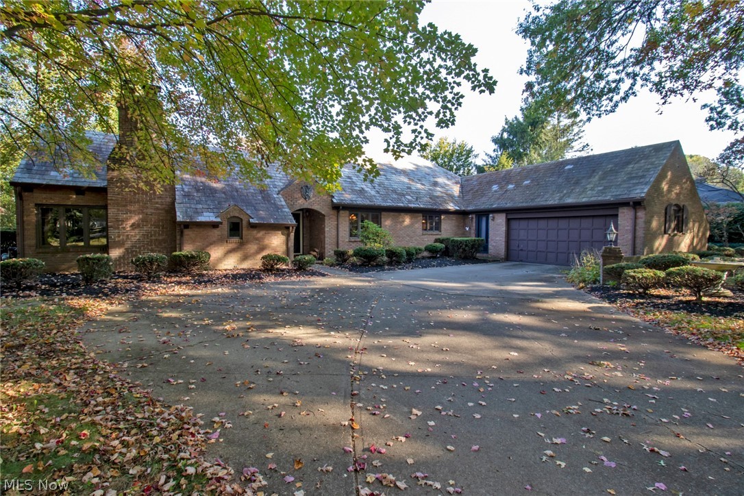 Wonderful iconic home situated in the heart of Wooster. This all brick home will not disappoint. It has been well maintained over the years which will allow the new owner to appreciate some of the many amazing features that were thoughtfully considered when the the home was built. From the slate floor of the foyer to the amazing built-ins and wet bar in the family room, this home has character! With 2398 sq. ft. of living space on the 1st and second floor, plus a finished lower level (additional 520 sq. ft.), there is room for everyone. 1st floor consist of family room with wood burning fireplace, wet bar and hardwood floors, a large living room that spans the back of the home with beautiful windows overlooking the private back yard. Formal dining with built in cabinetry, spacious kitchen with center island, built in desk, pantry area and small eating area, 1/2 bath, 1 bedroom with ensuite bathroom, 2nd bedroom with ensuite bathroom and a butlers pantry, that was once 1st floor la