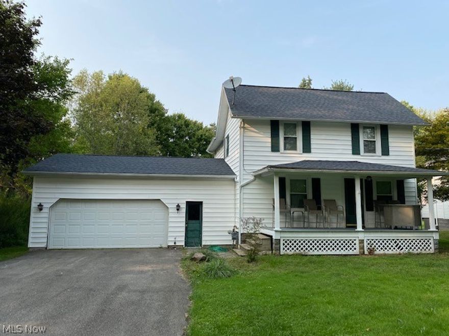 Welcome home to this darling three bedroom, two bath house located in Newton Falls! Sip coffee on the lovely porch and stare at that picture perfect lot. This winsome home has all original woodwork and doors! The charming kitchen has gorgeous cupboards and has been updated with all new flooring. Stroll up the stairs on the beautiful staircase and take a look at all three nice sized bedrooms. The master bedroom has an impressive walk-in closet. All new carpet throughout and new roof.