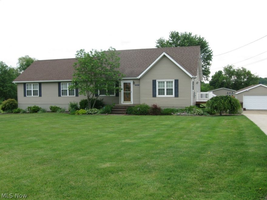 Beautiful and remodeled home situated on 2 1/2 acres with 4 bedrooms, 9 car garage and more! Gorgeous kitchen with hardwood floors, center island and double pantries. The first floor master suite was an added addition as well as a private master bath and walk-in closet. There are 2 additional bedrooms on the first floor along with a beautiful great room and dining room. The second floor hosts an additional bedroom and bonus room. The lower level has a rec room as well as two additional  rooms which could be used as either a bedroom, office or craft room. The home also has a 3 car attached garage as well as 2 detached 3 car garages. There is a 24 X 24 covered pavilion area with concrete floor that could be used for entertaining or parking an RV or boat. This home has so many features it is a must see! Please call for a private showing today!