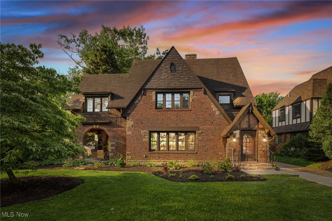 Lake Erie views and luxury await at 11205 Edgewater Dr, a fully rehabbed 4-bedroom, 4-bath brick home combining timeless craftsmanship with modern updates. This home is just minutes from Edgewater Beach and downtown, providing opportunities for relaxing and taking in all the city has to offer from shopping, dining, and entertainment. Inside the home, rich mahogany doors, woodwork, and trim add warmth and elegance, while large windows flood the home with natural sunlight. The spacious kitchen features all-new appliances (2025) and flows beautifully into the living areas, perfect for entertaining. Upstairs, you’ll find a convenient second-floor laundry (with additional hookups in the basement) in the fully rehabbed bathroom with new plumbing, generously sized bedrooms, and a large master bathroom for a private retreat. Recent upgrades include new hardwood floors and the original hardwood that was refinished, two new HVAC systems, and hot water tank (2025), plus a new driveway and a 220 outlet in the garage for electric vehicle charging. The roof was replaced in 2013 for added peace of mind. With ample curb appeal, stunning lake views, and thoughtful updates throughout, this home offers the rare combination of historic charm and modern convenience in one of Cleveland’s most sought-after locations.