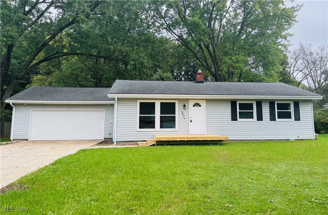 Have you been looking for a move-in ready ranch on over a half-acre? Look no further than 6074 Patricia Avenue! Situated close to shopping and convenient access to major roads yet feels like you are tucked away in peace and nature. This gorgeous home has been completely remodeled from top to bottom, including refinished floors throughout, updated kitchen, updated bathroom, updated windows, fresh paint, A/C, electrical, and much more! The entire house is neutral throughout, with warm toned flooring and updated lighting, the home feels light and airy. The living room and dining room are open to each other and lead directly into the kitchen. There is direct access to the newer back deck and large, private backyard. All three bedrooms have large closets and refinished wood flooring. The full bathroom has a double sink vanity and updated lighting and mirror. The full basement is ready to be finished and is the same footprint as the main floor, giving the ability for doubling the home's living area. This home will move quickly, so be sure to call TODAY for your private showing.