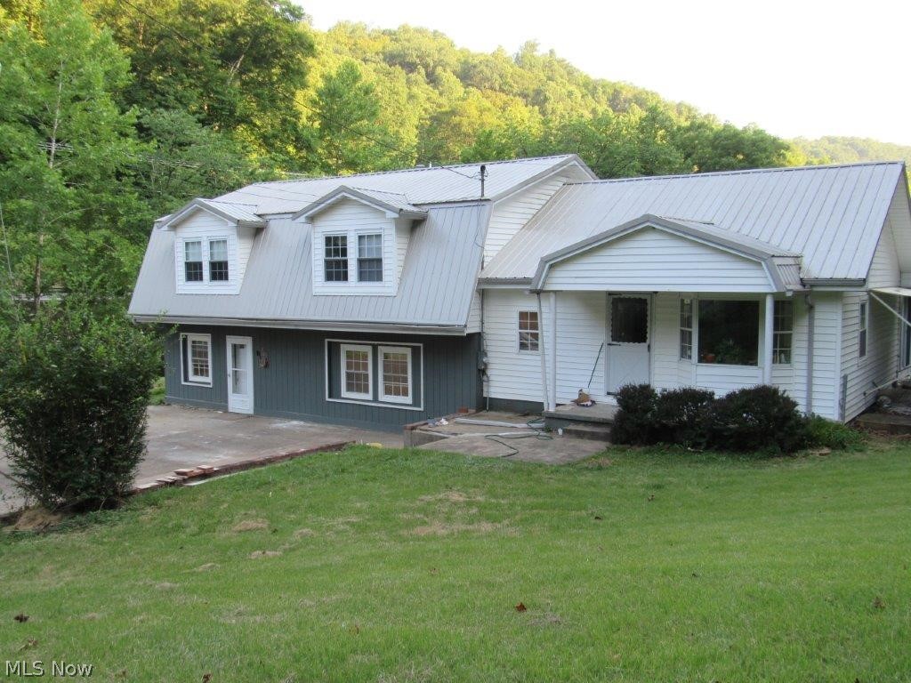 29 Acres. Multi-level home built in 1979. Country hom, 2,759 sqft living space. 4 bedrooms, 2 baths, kitchen, dining/living room 16x26, laundry, utility room, sunroom, 20x20 carport, deck, porch, 25x35 pole building. Open land for livestock. Small stream, convenient to Spencer or I-79 to Charleston. House needs some TLC. Property borders US119, easy access. New heating/air.