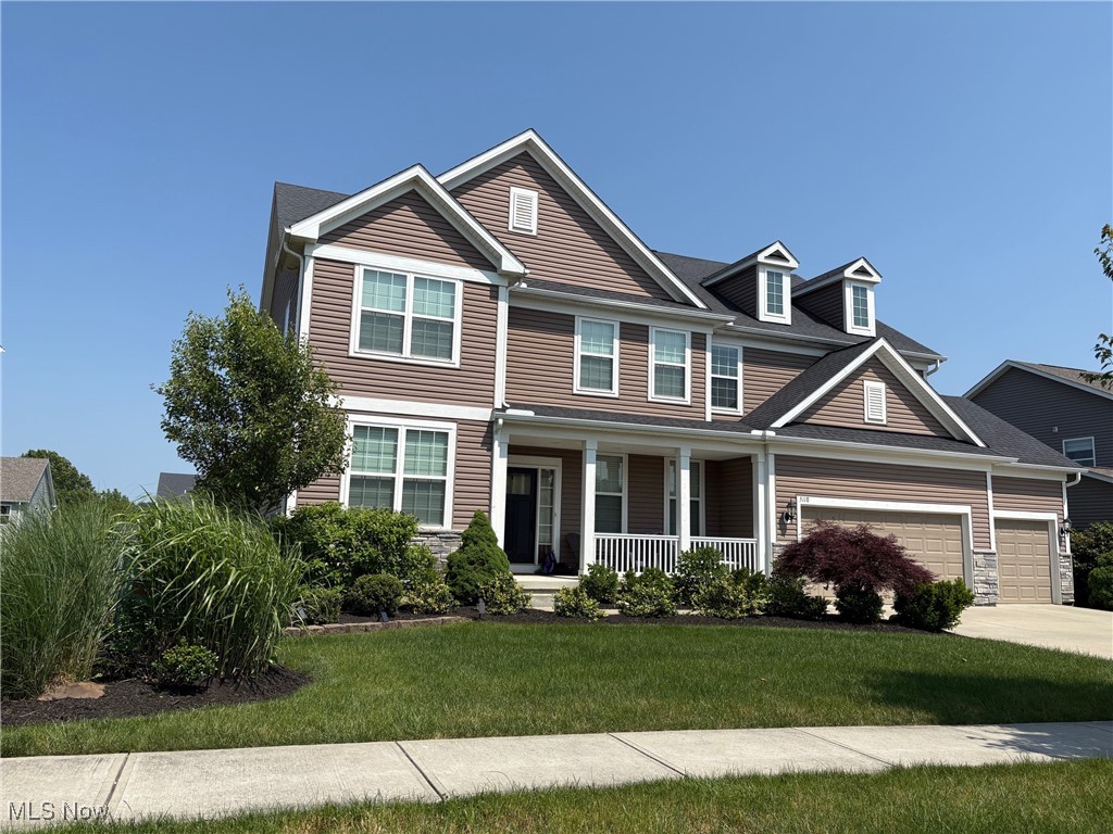 Welcome to this beautifully maintained five bed and five bath colonial in the Preserve at Miller's Farm in Revere School District in a quiet neighborhood with sidewalks and minutes to the Montrose Shopping District. Enjoy the homes landscaping as you step up to the large front porch, then the front door, and into the spacious foyer. On the left side of the foyer you will find a great office and on the right side you will be greeted by an area that can be a dining or sitting room or whatever you need it to be. As you walk farther into the home you will find the opening to the 2-story Great Room, huge Eat in Kitchen Area, and fantastic Sunroom that leads out to the deck. The back wall of the house is open and filled with light from the massive amount of windows going all the way up to the ceiling. On this floor you will also find a fireplace, granite countertops, planning center, walk in pantry, laundry room, mudroom, half bath, and the 3 car garage. On the 2nd floor you discover 4 bedrooms all with walk in closets and three full bathrooms. The master suite is a private retreat with a sitting room between the bedroom and spacious four piece bathroom. On this floor you will also discover a loft area that could be a sixth bedroom, office, or playroom. The walkout finished basement has a Media Room, Gym, one more bedroom and full bathroom, and huge open Recreation Room that opens to the backyard, playground, and large Patio. Entertaining will be simple in this amazing home with so much room to enjoy.