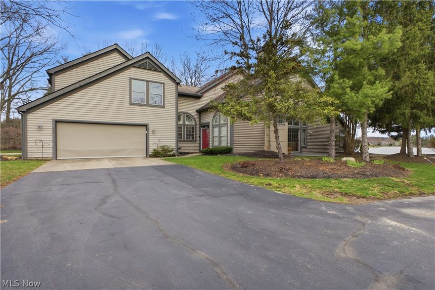 Welcome to Lakefront Living at Its Finest! Discover the lifestyle you've been dreaming of in this stunning 3-bedroom, 2-bathroom condo nestled along the waterfront in Columbiana — proudly named the Nicest Place in America by Reader's Digest. 
This is more than a home; it's a retreat where every day feels like a getaway. Step inside and be captivated by soaring cathedral ceilings and natural light streaming through skylights, creating an airy and inviting atmosphere throughout. The updated kitchen showcases elegant granite countertops, making it the perfect gathering spot for culinary adventures and casual conversations alike. Two gas fireplaces add warmth and ambiance, transforming cool evenings into cozy memories whether you're relaxing on the main level or entertaining upstairs. The thoughtfully designed two-story layout features a coveted first-floor master bedroom for effortless daily living, along with a convenient first-floor laundry room that simplifies your routine. Fresh interior paint gives the space a modern, move-in-ready feel. Step outside onto either of the two spacious decks and soak in breathtaking lake views that change beautifully with every season. For music lovers, the home comes wired for a whole-house audio system — your personal soundtrack awaits. Community amenities elevate the experience even further, with a clubhouse and pool available for residents to enjoy. Nearby, you'll find Firestone Park for outdoor recreation, TownCenter at Firestone Farms for convenient shopping and dining, and The Links at Firestone Farms for golf enthusiasts. Quick access to Route 11 and being within an hour of Pittsburgh Airport keeps you connected to everything the region offers while you enjoy the serenity of lakefront living. This is your invitation to experience small-town charm with modern comforts. Schedule your private showing today before this gem is gone!