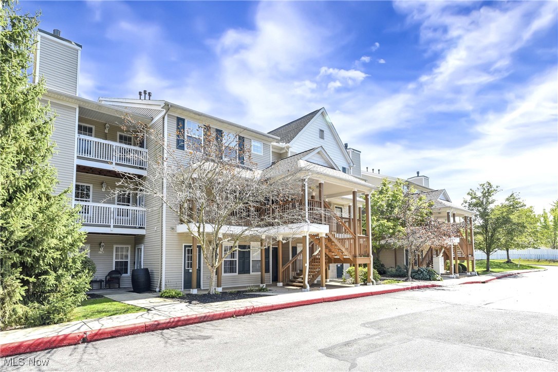 Welcome to 28360 Center Ridge Road #226, a thoughtfully updated 2-bedroom, 2-bathroom condo in the Lenox Ridge community. This spacious second-story unit showcases newer luxury vinyl plank flooring (2024) throughout the living areas and bedrooms, paired with fresh tile (2024) in both bathrooms. Upon entering, you're immediately welcomed by a well planned layout that offers both comfort and functionality. To the right is a generously sized private primary bedroom and a large walk-in closet. The bathroom includes a double vanity, providing plenty of storage. Moving to the left, the home opens up into a bright and inviting living room centered around a cozy gas fireplace—an ideal space for both everyday relaxation and entertaining. Adjacent to the living room is a designated dining area, perfect for hosting meals or casual gatherings. The galley-style kitchen is filled with crisp white cabinetry, creating a cheerful and efficient cooking space. Conveniently located just off the kitchen, the laundry room offers additional storage options and adds to the unit’s practical layout. The second bedroom and full guest bathroom are tucked away off the main living area—offering comfort and privacy for visitors or a quiet home office retreat. To complete the space, step through the living room onto your own private balcony, ideal for enjoying a morning coffee or unwinding at the end of the day. Ideally situated near schools, shopping and restaurants this home offers everyday convenience with everything you need just minutes away.