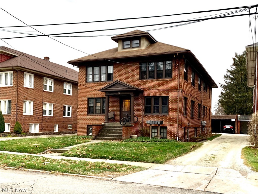 All Brick 5 Unit - Loads of charm and always rented. Units have hardwood except in the kitchen and bathrooms. Lower Unit has a ceramic wood Grain flooring. Tenant pays for Electric and Cooking fuel. Updated Electric. New Roof in Approx 2010. Each unit has covered parking, coin operated laundry is profitable.