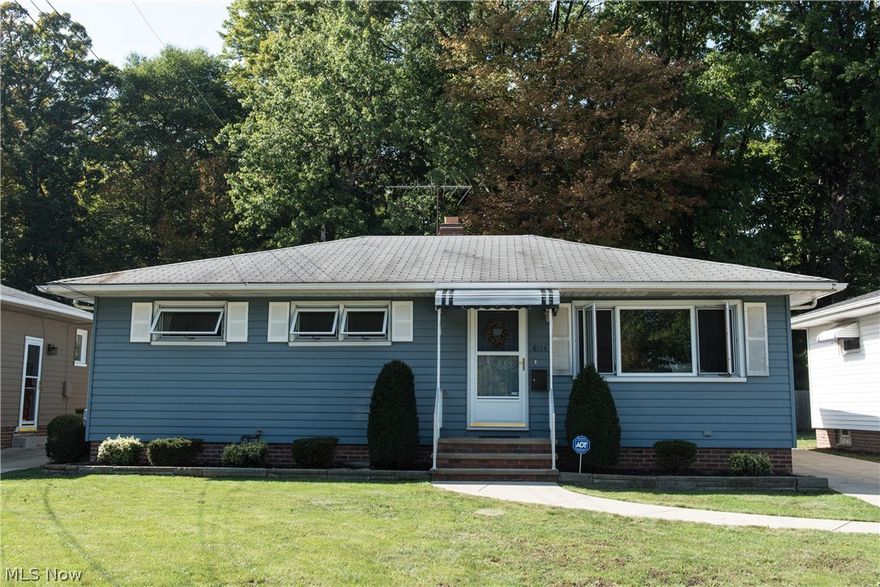 Call this house, Home!! Just minutes from OH City, Tremont, Down Town & all Major Highways, E/W, this S Hills Ranch is a Retreat* Offering 2 Full Flrs of Liv Space, about 2150 Sq Ft, Hrdwd Flrs, some Carpet, Newer Wd Case Windows & Neutral Tones, creating an easy palette for this 3 bdrm, 2 Full Bth w/ Upgrades In/Out* A Spacious Liv rm w/front Picture Windows & Hrdwd Flrs (main area Refin), leads to a Din area & well equipped Kit of All Newer Appl's, matched w/ an abundance of Cupboards/Counter Space* Coupled, is a Lg paneled Great rm addition w/ Berber Carpet & Newer Sliding Patio Dr, Extending out, to a covered Patio & Partially Wd Fenced Pretty Yard w/ Metro Park beyond* Mstr Bdrm w/ Dbl dr Closet, fits the King Size Bed comfortably, while 2 Addtl Bdrms (all Hrd wd), have ample Closets & Full Hall Bth w/tub completing the 1st Flr* The LL ( Glass Block Windows thru out), provides a carpeted Lg Fin Rec rm w/ Full Built in Bar, Sink & Stools (Incl), opens into a bonus area, great for H