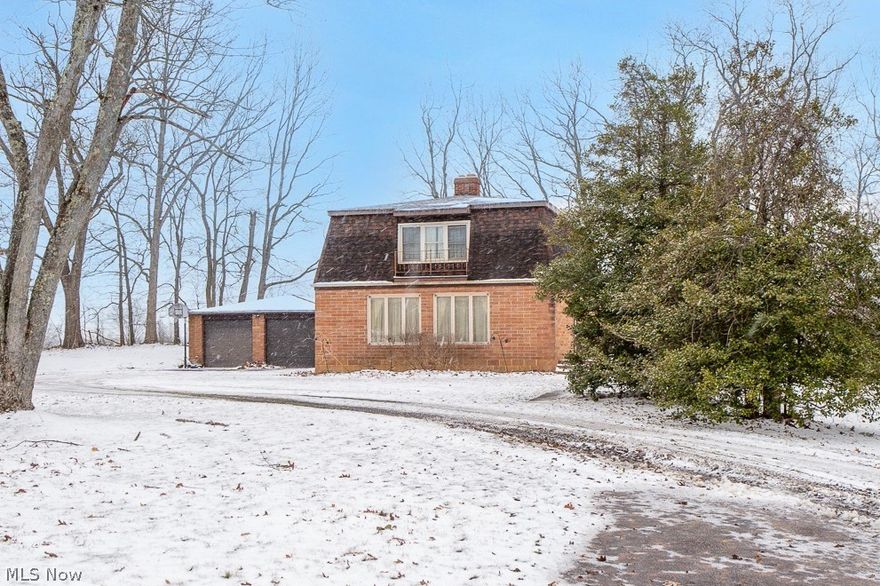 This unique, well-built brick home is on the market for the first time. Offering exceptional privacy and potential, the property features spacious rooms and abundant storage throughout, including a kitchen pantry, numerous closets, and a full basement.  The main level includes an eat-in kitchen with an island, oak cabinets, and pull-out shelves. The large dining room features two closets and a half bath, leading into a living room complete with beautiful built-in shelving and a wood-burning stove. Upstairs, you will find three generously sized bedrooms and a centrally located full bathroom. The primary bedroom includes two separate closets of its own. The upstairs windows are newer, the main part of the roof is about 5 years old and newer Pella french doors with built-in blinds in the dining room.  There is a side deck and back deck off the home to enjoy nature and so much more. Home warranty is offered, come take a look!